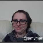 zoom screenshot of me, sitting on the sofa
