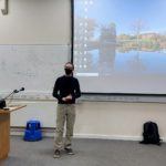 Chris Street at front of lecture hall