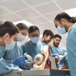 Teaching students in a anatomy laboratory