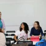 Laura with students