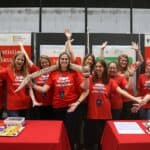 People in red t-shirts