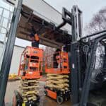 Helping on the forklift to add new detector panels to our CarView system