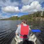 A picture of me kayaking in Nuuksio national park outside Helsinki after a conference